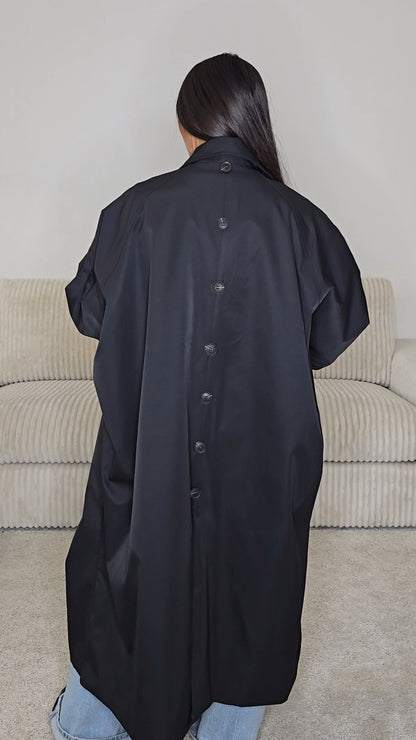 Trench long oversize noir à écharpe amovible – Élégance contemporaine