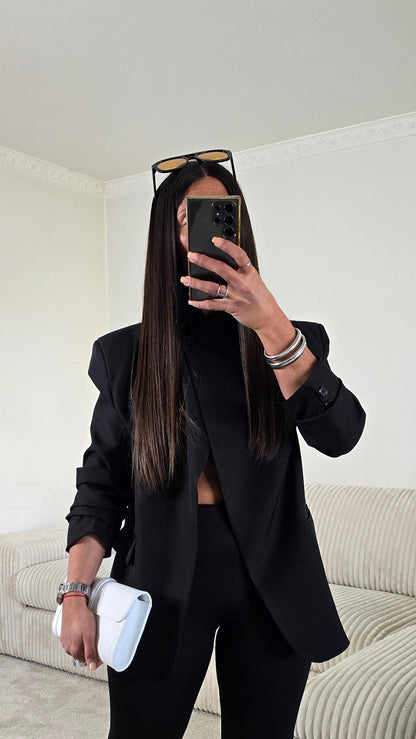 Blazer asymétrique structuré – noir intemporel