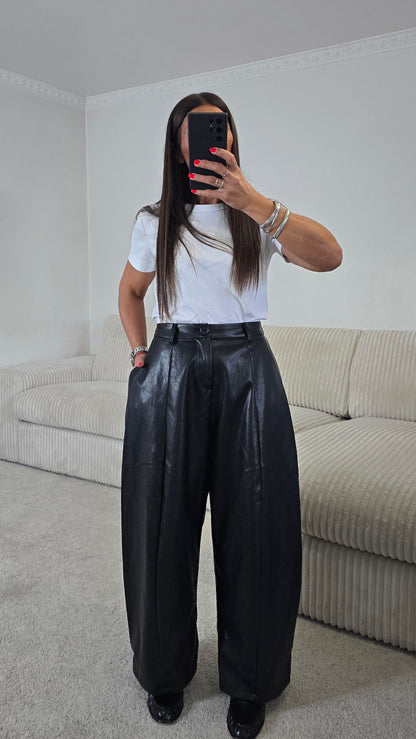 Pantalon ballon en simili cuir noir