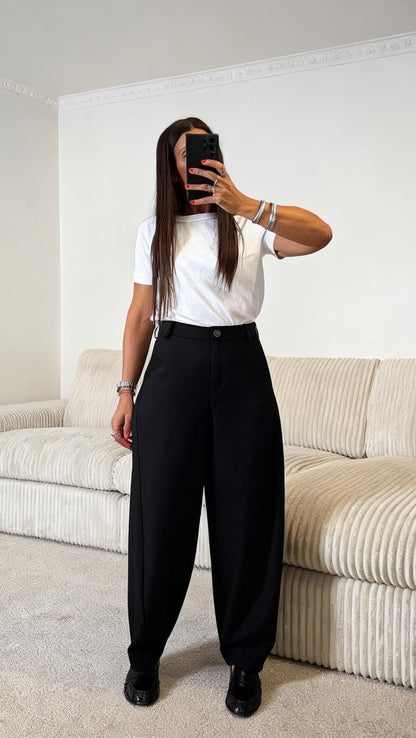 Pantalon tailleur noir coupe ballon
