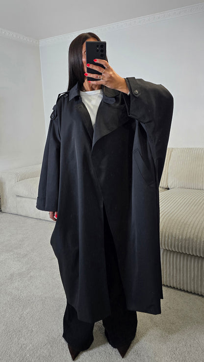 Trench long oversize noir – Élégance contemporaine